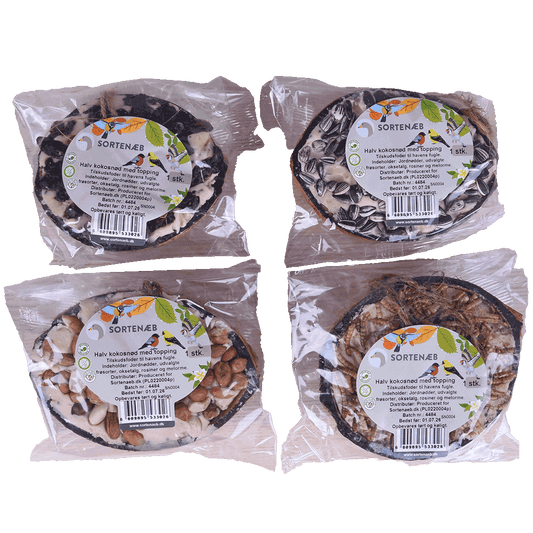 Svartnäbbad blandning av halva kokosnötter med topping (blandat) - pris per styck!